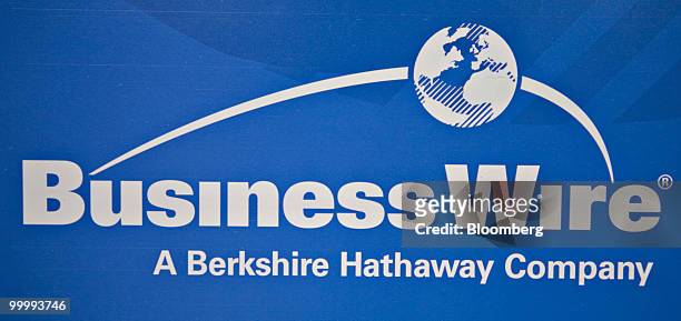 Business Wire Inc. Logo sits on display on the sidelines of the Berkshire Hathaway annual meeting in Omaha, Nebraska, U.S., on Saturday, May 1, 2010....
