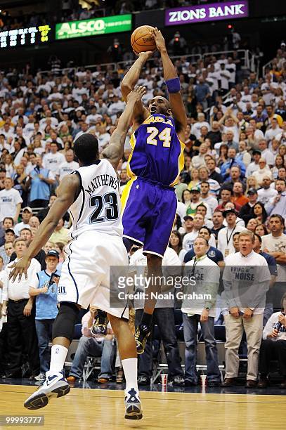 Kobe Bryant of the Los Angeles Lakers shoots a jump shot against Wesley Matthews of the Utah Jazz in Game Three of the Western Conference Semifinals...
