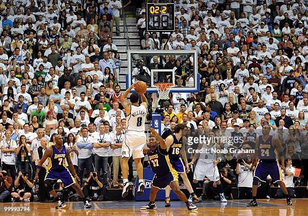 Deron Williams of the Utah Jazz shoots and misses the game winner with 2.2 seconds left on the game clock against Ron Artest of the Los Angeles...