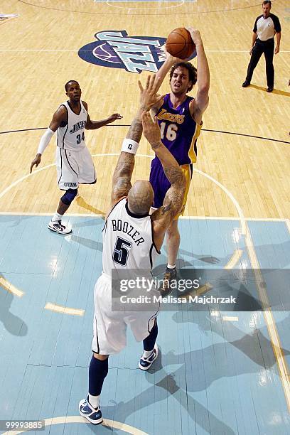 Pau Gasol of the Los Angeles Lakers shoots a jumper against Carlos Boozer of the Utah Jazz in Game Three of the Western Conference Semifinals during...