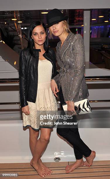 Leigh Lezark of the MisShapes and model Karolina Kurkova attend the "Art of Elysium Paradis Dinner and Party" at Michael Saylor's Yacht, Slip S05...