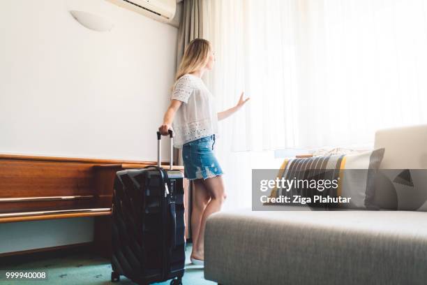 i love our hotel room! - ziga plahutar stock pictures, royalty-free photos & images