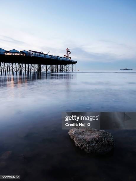 rocky pier of herne bay - herne bay stock pictures, royalty-free photos & images