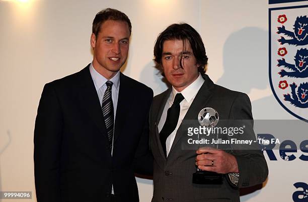 Prince William presents the National League System Club Steps 1 to 4 to Simon Clifford at the Respect and Fair Play Awards at Wembley Stadium on May...