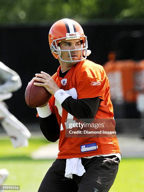 Quarterback Jake Delhomme of the Cleveland Browns looks for an open receiver during the team's organized team activity on May 19, 2010 at the...