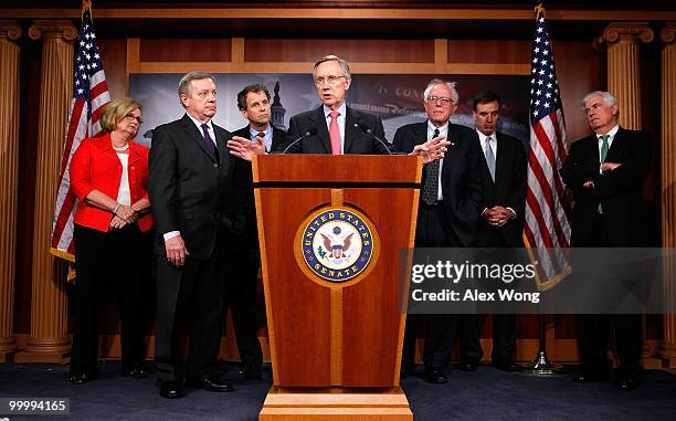 Senate Majority Leader Harry Reid speaks as Sen. Claire McCaskill , Senate Majority Whip Richard Durbin , Sen. Sherrod Brown , Sen. Bernard Sanders ,...