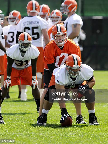 Quarterback Jake Delhomme of the Cleveland Browns looks over the defense as center Alex Mack waits to snap the ball during the team's organized team...