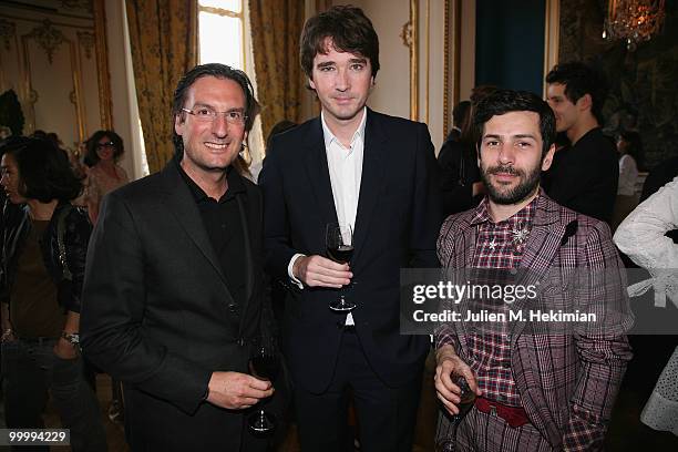 Pietro Beccari, Antoine Arnault and Alexis Mabille attend the coctail reception for W Magazine's editor-in-chief at the Hotel D'Evreux on May 19,...