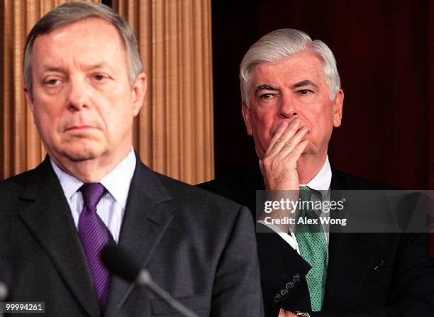 Senate Majority Whip Richard Durbin , and Sen. Christopher Dodd listen during a news conference on Capitol Hill May 19, 2010 in Washington, DC....