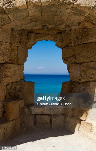 aegean sea through the wall - buisson stock pictures, royalty-free photos & images