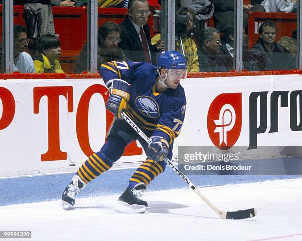 Pierre Turgeon of the Buffalo Sabres skates against the Montreal Canadiens in the early 1990's at the Montreal Forum in Montreal, Quebec, Canada.