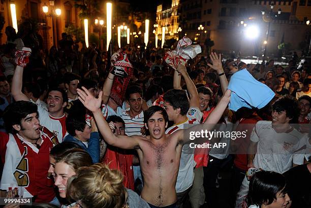 Sevilla's supporters celebrates their victory after winning the King's Cup final match against Atletico Madrid on May 19, 2010 in Seville. Sevilla...
