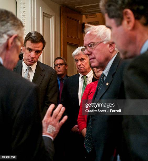May 19: At left, Senate Majority Leader Harry Reid, D-Nev., huddles with angry and frustrated fellow Democrats before a news conference after their...