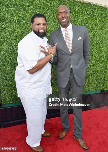 Andre Farr and John Salley attend the 33rd Annual Cedars-Sinai Sports Spectacular at The Compound on July 15, 2018 in Inglewood, California.