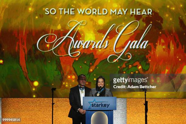 Ehsan Bayat and Fatema Laya Bayat take the stage at the 2018 So the World May Hear Awards Gala benefitting Starkey Hearing Foundation at the Saint...