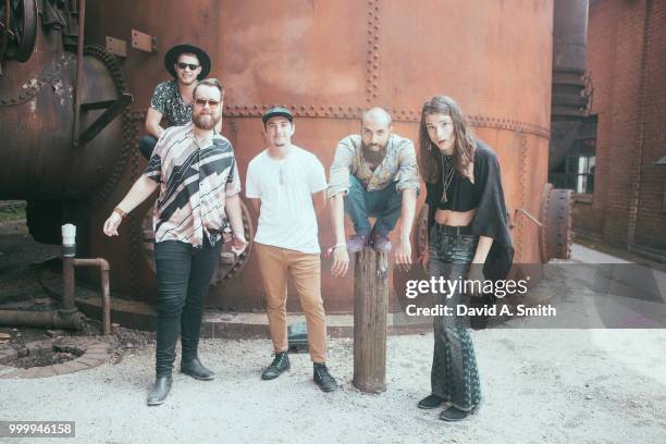 Ethan Goodpaster, Darrick "Buzzy" Keller, Jess Haney, Sam Melo, and Charlie Holt of Rainbow Kitten Surprise pose backstage at Sloss Furnace on July...