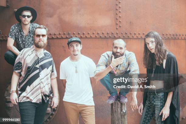 Ethan Goodpaster, Darrick "Buzzy" Keller, Jess Haney, Sam Melo, and Charlie Holt of Rainbow Kitten Surprise pose backstage at Sloss Furnace on July...