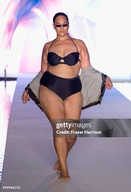 Model walks the runway for the 2018 Sports Illustrated Swimsuit show at PARAISO during Miami Swim Week at The W Hotel South Beach on July 15, 2018 in...