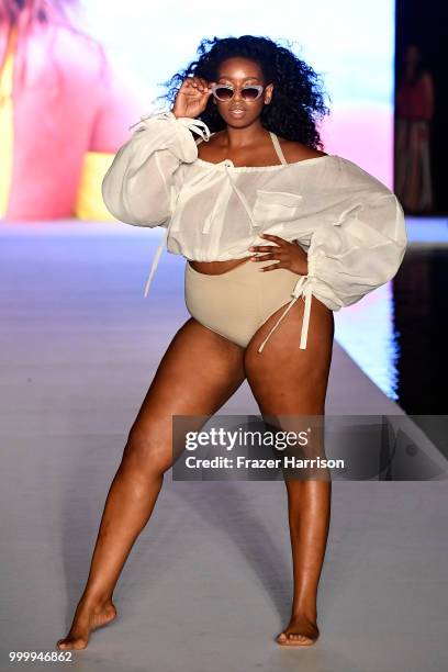 Model walks the runway for the 2018 Sports Illustrated Swimsuit show at PARAISO during Miami Swim Week at The W Hotel South Beach on July 15, 2018 in...