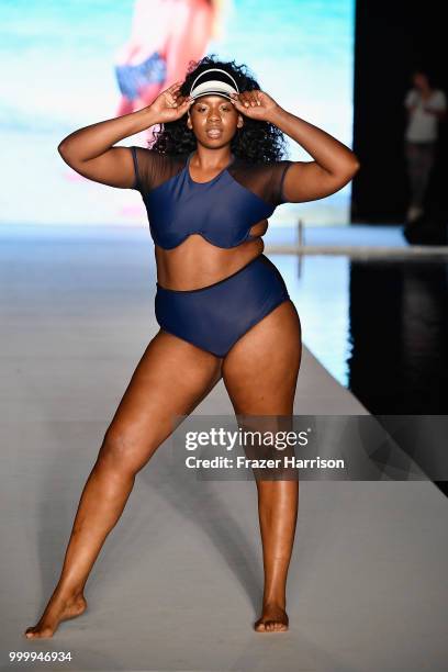 Model walks the runway for the 2018 Sports Illustrated Swimsuit show at PARAISO during Miami Swim Week at The W Hotel South Beach on July 15, 2018 in...