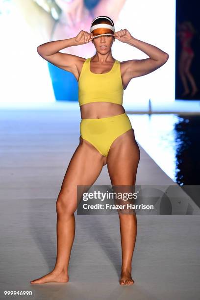 Model walks the runway for the 2018 Sports Illustrated Swimsuit show at PARAISO during Miami Swim Week at The W Hotel South Beach on July 15, 2018 in...