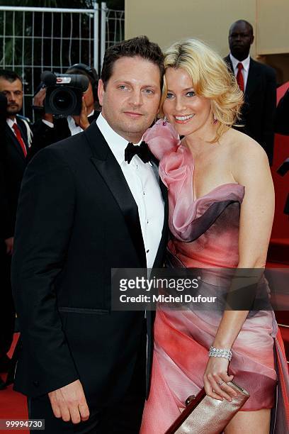 Elizabeth Banks and guest attend the 'Poetry' Premiere at the Palais des Festivals during the 63rd Annual Cannes Film Festival on May 19, 2010 in...