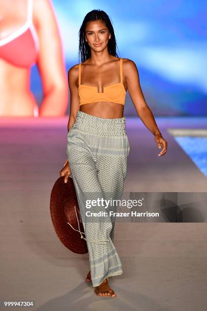 Model walks the runway for the 2018 Sports Illustrated Swimsuit show at PARAISO during Miami Swim Week at The W Hotel South Beach on July 15, 2018 in...