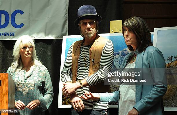 Singers & Songwriters Emmylou Harris, Big Kenny Alphin and Kathy Mattea addresses the press during the" Music Saves Mountains" benefit concert press...