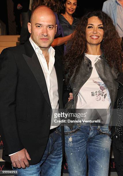 Replay's CEO Matteo Sinigaglia and Afef Jnifen attend the Replay Party held at the Star Style Lounge during the 63rd Annual International Cannes Film...