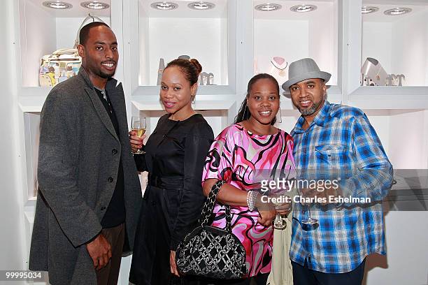 Universal Music's Brandon Hixon, Ka Devereux designers Latifah McKinney, Tracy Queen and Universal Music's Keith Wok Watts attend the in store...