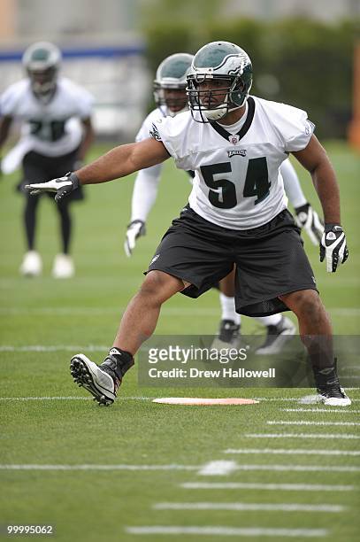 Defensive end Brandon Graham of the Philadelphia Eagles comes off the line during practice on May 19, 2010 at the NovaCare Complex in Philadelphia,...