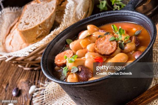 polish baked beans with sausage - brassica rapa stock pictures, royalty-free photos & images