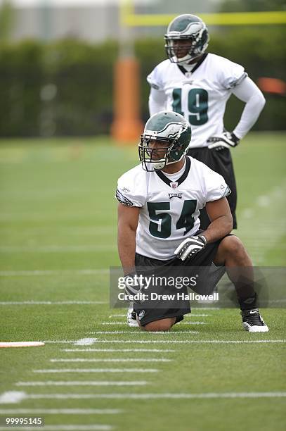 Defensive end Brandon Graham of the Philadelphia Eagles kneels during practice on May 19, 2010 at the NovaCare Complex in Philadelphia, Pennsylvania.