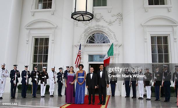 President Barack Obama , and his wife first lady Michelle Obama stand with Mexican President Felipe Calderon and his wife Margarita Zavala after...