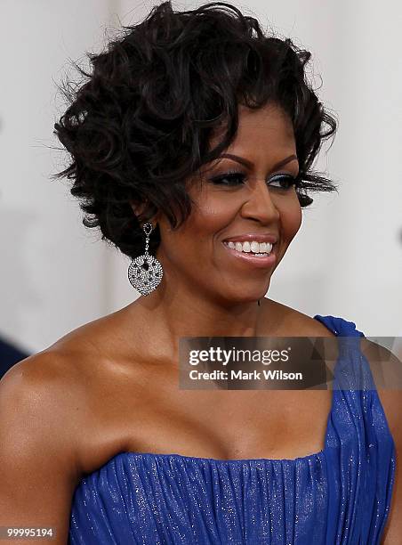 First lady Michelle Obama and her husband U.S President Barack Obama wait for Mexican President Felipe Calderon and his wife Margarita Zavala to...