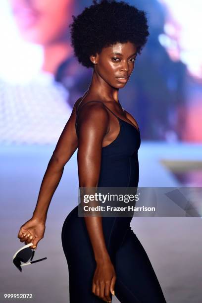 Model walks the runway for the 2018 Sports Illustrated Swimsuit show at PARAISO during Miami Swim Week at The W Hotel South Beach on July 15, 2018 in...