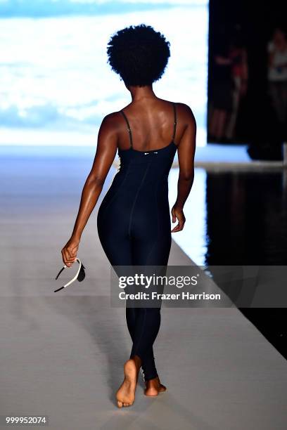 Model walks the runway for the 2018 Sports Illustrated Swimsuit show at PARAISO during Miami Swim Week at The W Hotel South Beach on July 15, 2018 in...