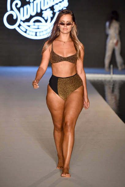 Model walks the runway for the 2018 Sports Illustrated Swimsuit show at PARAISO during Miami Swim Week at The W Hotel South Beach on July 15, 2018 in...