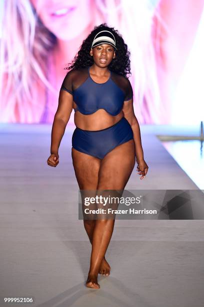 Model walks the runway for the 2018 Sports Illustrated Swimsuit show at PARAISO during Miami Swim Week at The W Hotel South Beach on July 15, 2018 in...