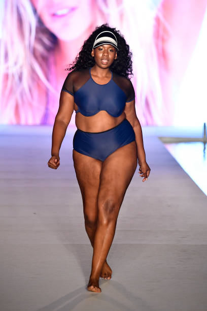 Model walks the runway for the 2018 Sports Illustrated Swimsuit show at PARAISO during Miami Swim Week at The W Hotel South Beach on July 15, 2018 in...