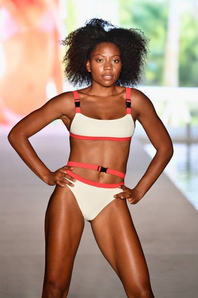 Model walks the runway for the 2018 Sports Illustrated Swimsuit show at PARAISO during Miami Swim Week at The W Hotel South Beach on July 15, 2018 in...
