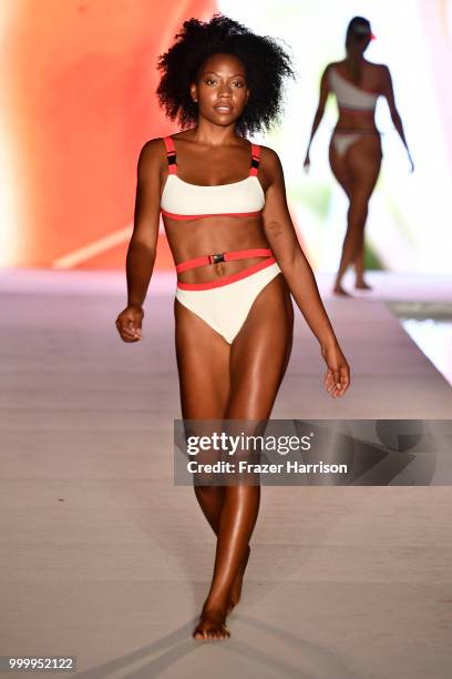 Model walks the runway for the 2018 Sports Illustrated Swimsuit show at PARAISO during Miami Swim Week at The W Hotel South Beach on July 15, 2018 in...