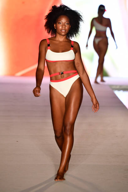 Model walks the runway for the 2018 Sports Illustrated Swimsuit show at PARAISO during Miami Swim Week at The W Hotel South Beach on July 15, 2018 in...