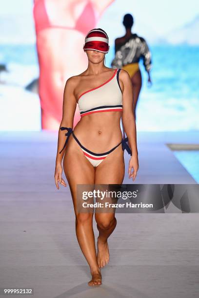 Model walks the runway for the 2018 Sports Illustrated Swimsuit show at PARAISO during Miami Swim Week at The W Hotel South Beach on July 15, 2018 in...