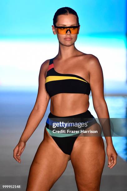 Model walks the runway for the 2018 Sports Illustrated Swimsuit show at PARAISO during Miami Swim Week at The W Hotel South Beach on July 15, 2018 in...