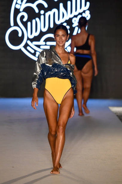 Model walks the runway for the 2018 Sports Illustrated Swimsuit show at PARAISO during Miami Swim Week at The W Hotel South Beach on July 15, 2018 in...