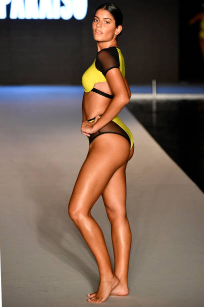 Model walks the runway for the 2018 Sports Illustrated Swimsuit show at PARAISO during Miami Swim Week at The W Hotel South Beach on July 15, 2018 in...