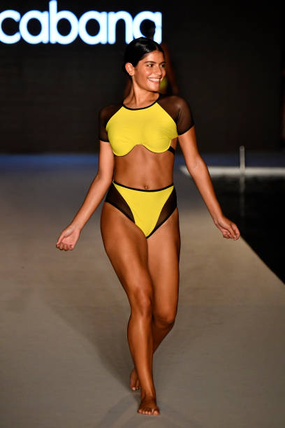 Model walks the runway for the 2018 Sports Illustrated Swimsuit show at PARAISO during Miami Swim Week at The W Hotel South Beach on July 15, 2018 in...