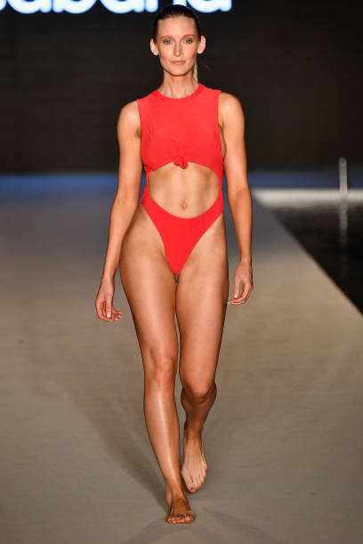 Model walks the runway for the 2018 Sports Illustrated Swimsuit show at PARAISO during Miami Swim Week at The W Hotel South Beach on July 15, 2018 in...