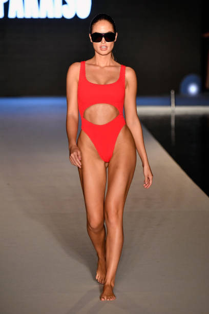 Model walks the runway for the 2018 Sports Illustrated Swimsuit show at PARAISO during Miami Swim Week at The W Hotel South Beach on July 15, 2018 in...